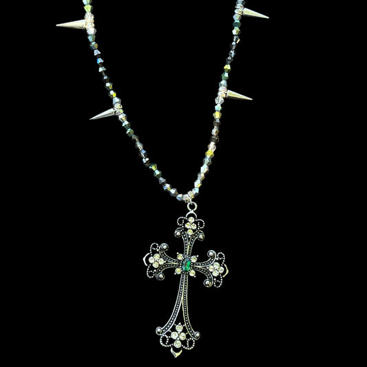 Handmade metallic necklace with gothic cross and spikey design, perfect for grunge and alternative fashion.